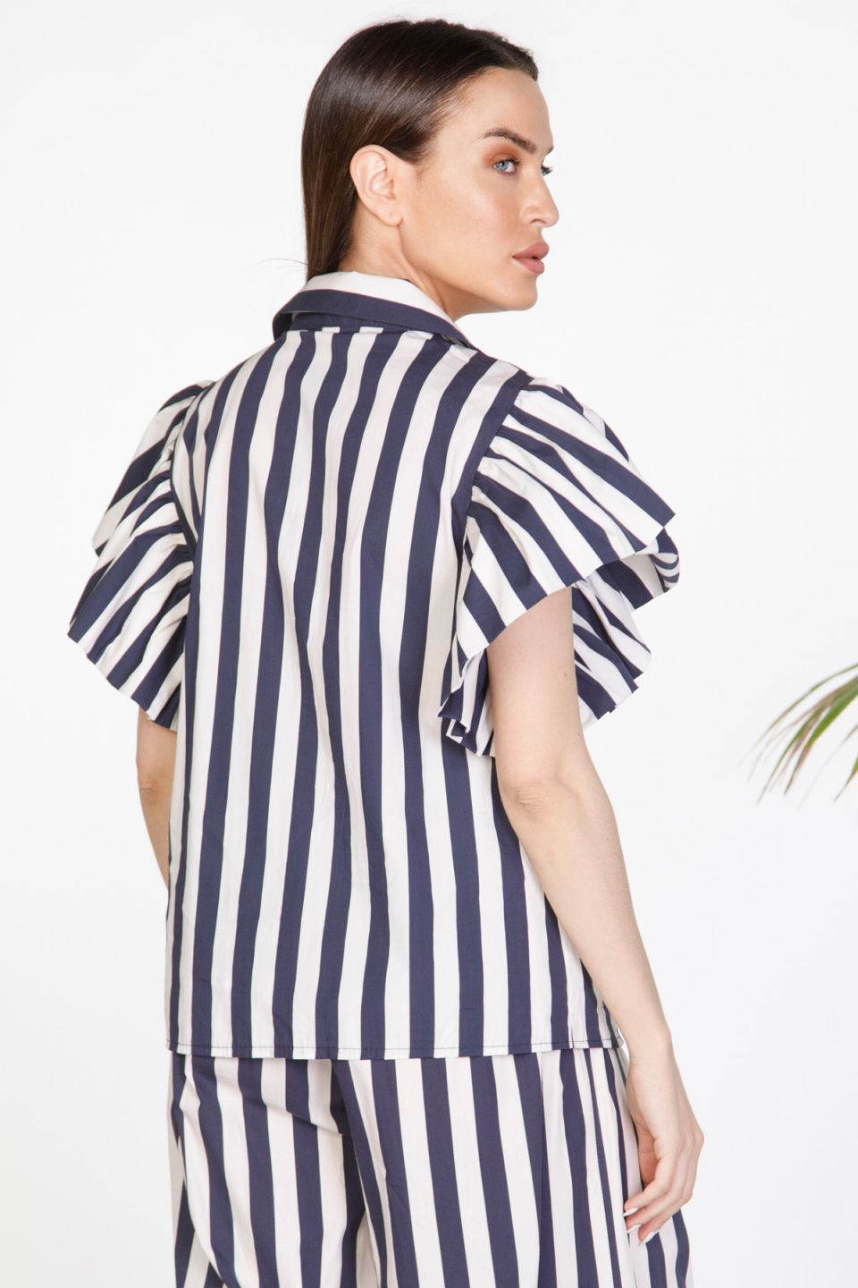 Striped shirt with dramatic ruffle sleeves