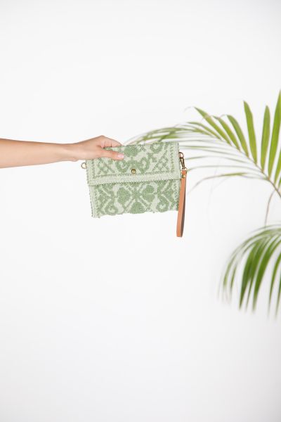 Woven clutch with geometric pattern