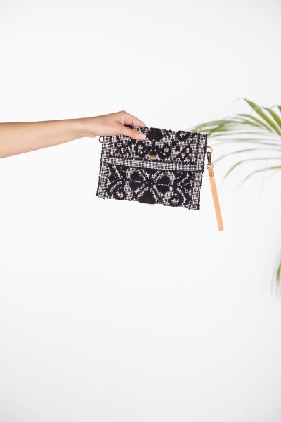 Woven clutch with geometric pattern