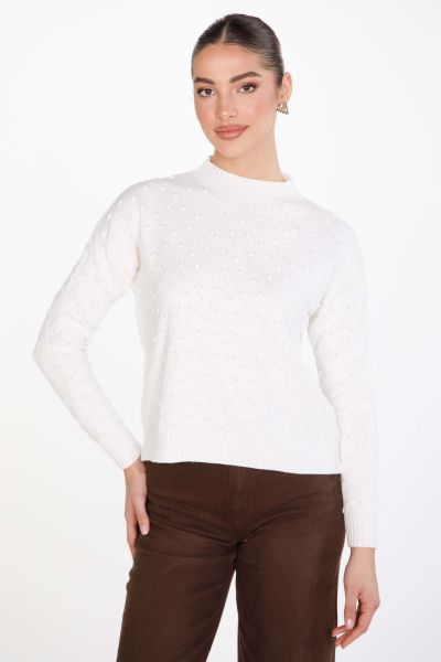 Knitted blouse with polka dot pattern