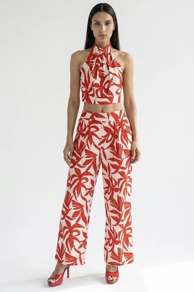 Printed halter crop top and pleated trousers set