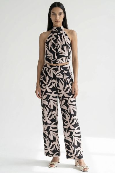 Printed halter crop top and pleated trousers set