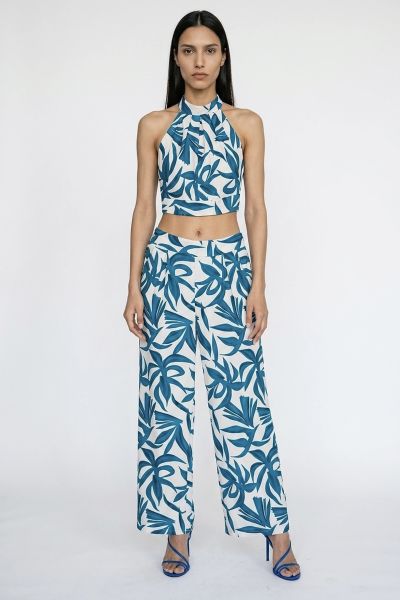 Σετ εμπριμέ halter crop top και παντελόνι με πιέτες