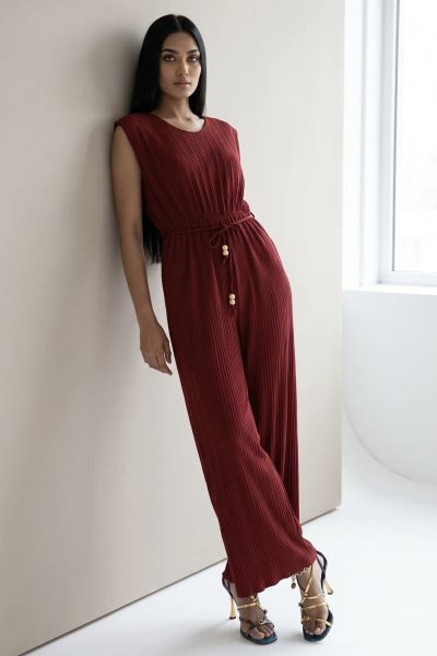 Pleated jumpsuit with shoulder pads