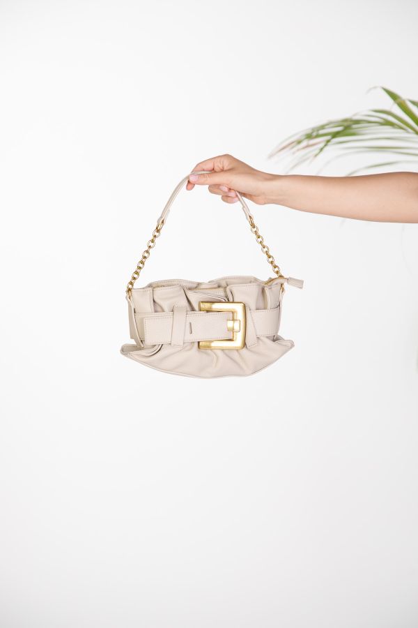 Shoulder bag with decorative buckle and chain