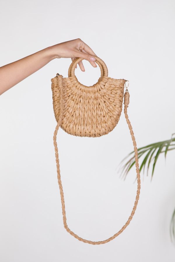 Woven half-moon bag with round top handle
