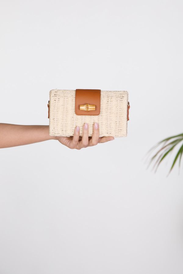 Straw clutch bag with leather detail