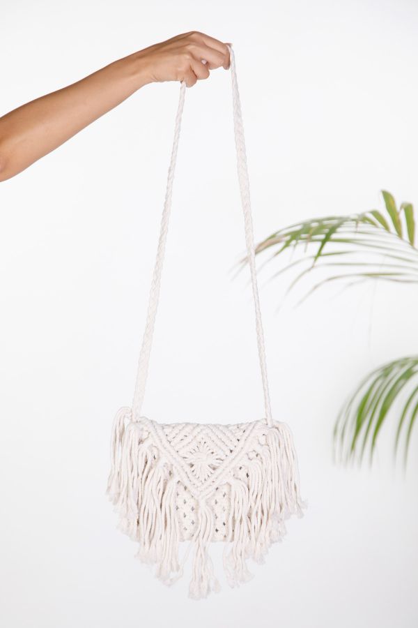Knit envelope bag with fringes and strap
