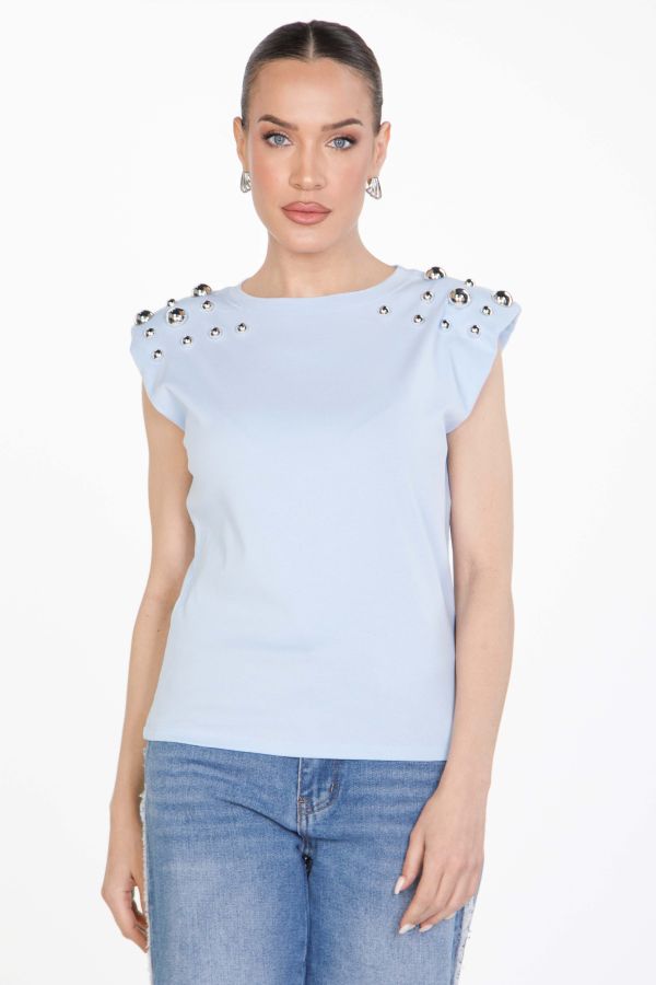 Sleeveless blouse with padding and studs