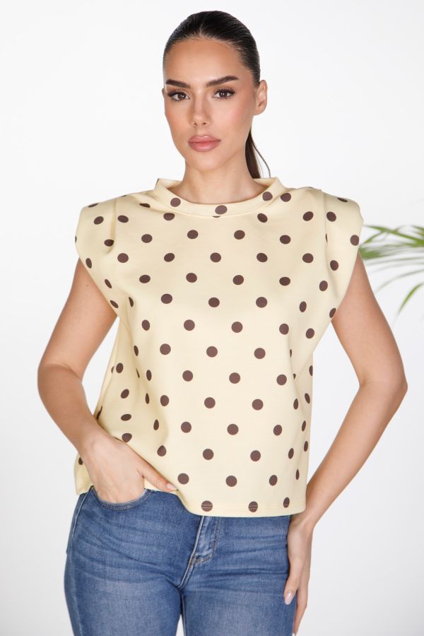 Sleeveless polka dot blouse with puff shoulders