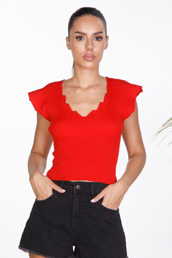Ribbed blouse with ruffles