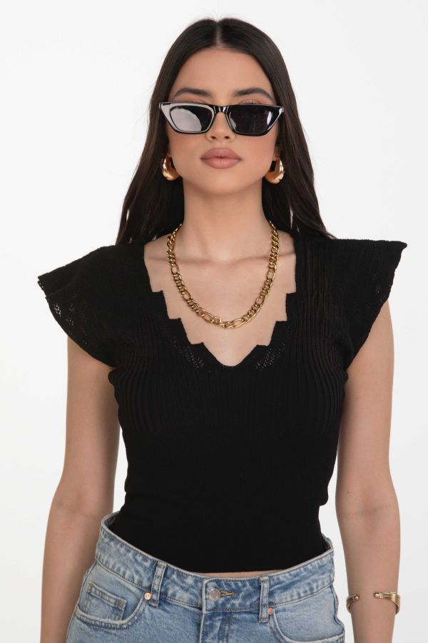 Ribbed blouse with ruffles
