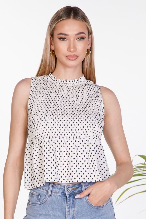 Sleeveless polka dot smocked top