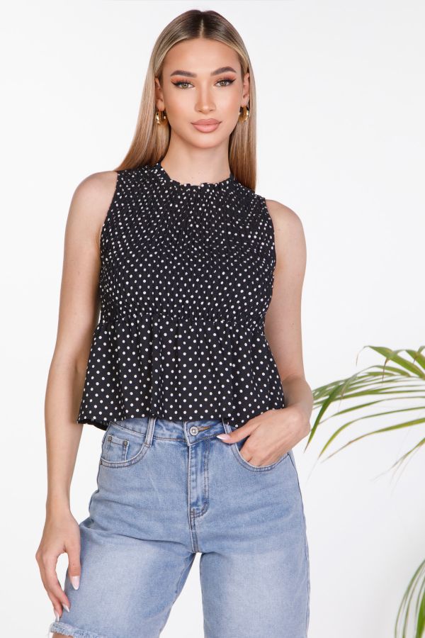 Sleeveless polka dot smocked top