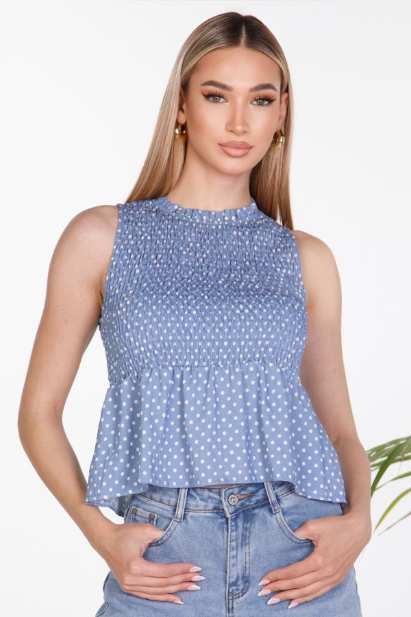 Sleeveless polka dot smocked top