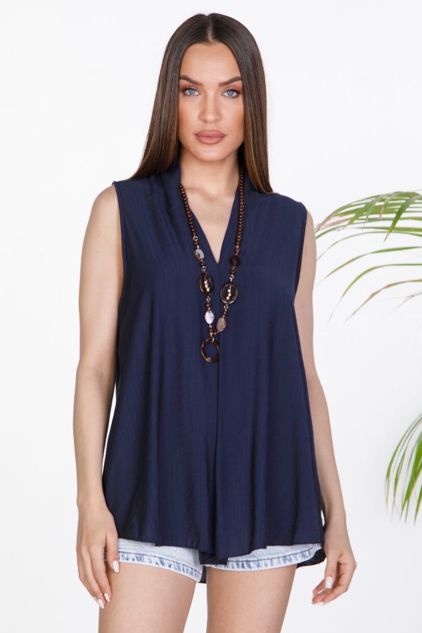 Sleeveless V-neck top with decorative necklace