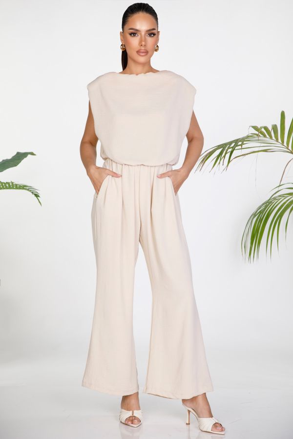 Jumpsuit with shoulder pads and open back