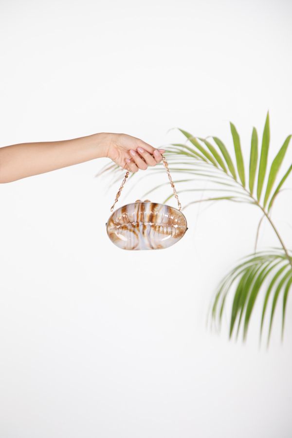 Acrylic shell-shaped evening clutch
