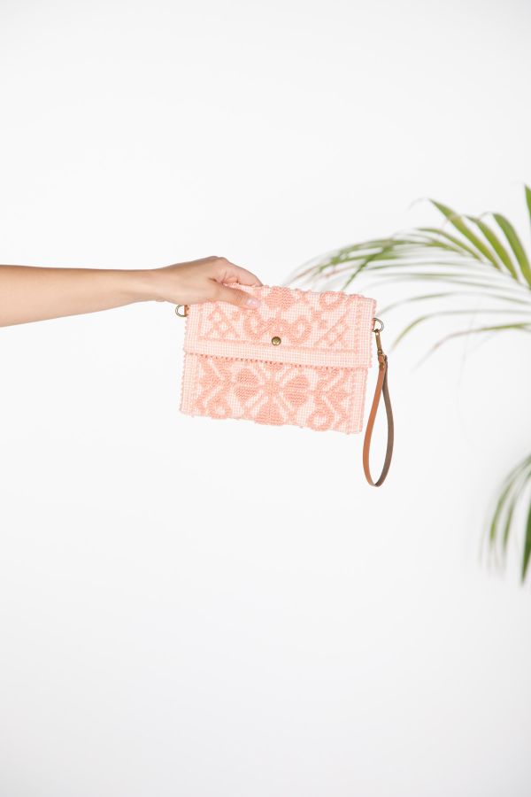 Woven clutch with geometric pattern