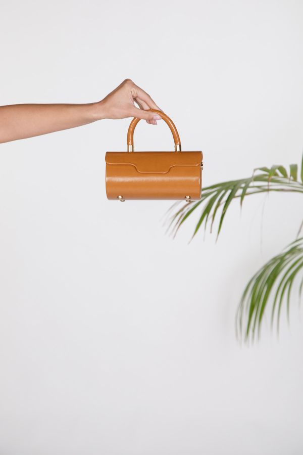 Cylinder top-handle bag with front flap