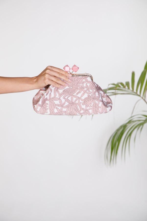 Embossed floral clutch bag