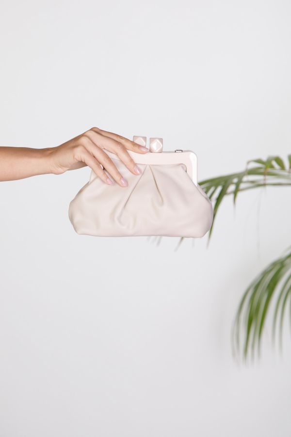 Slouchy clutch bag with gathers and geometric clasp