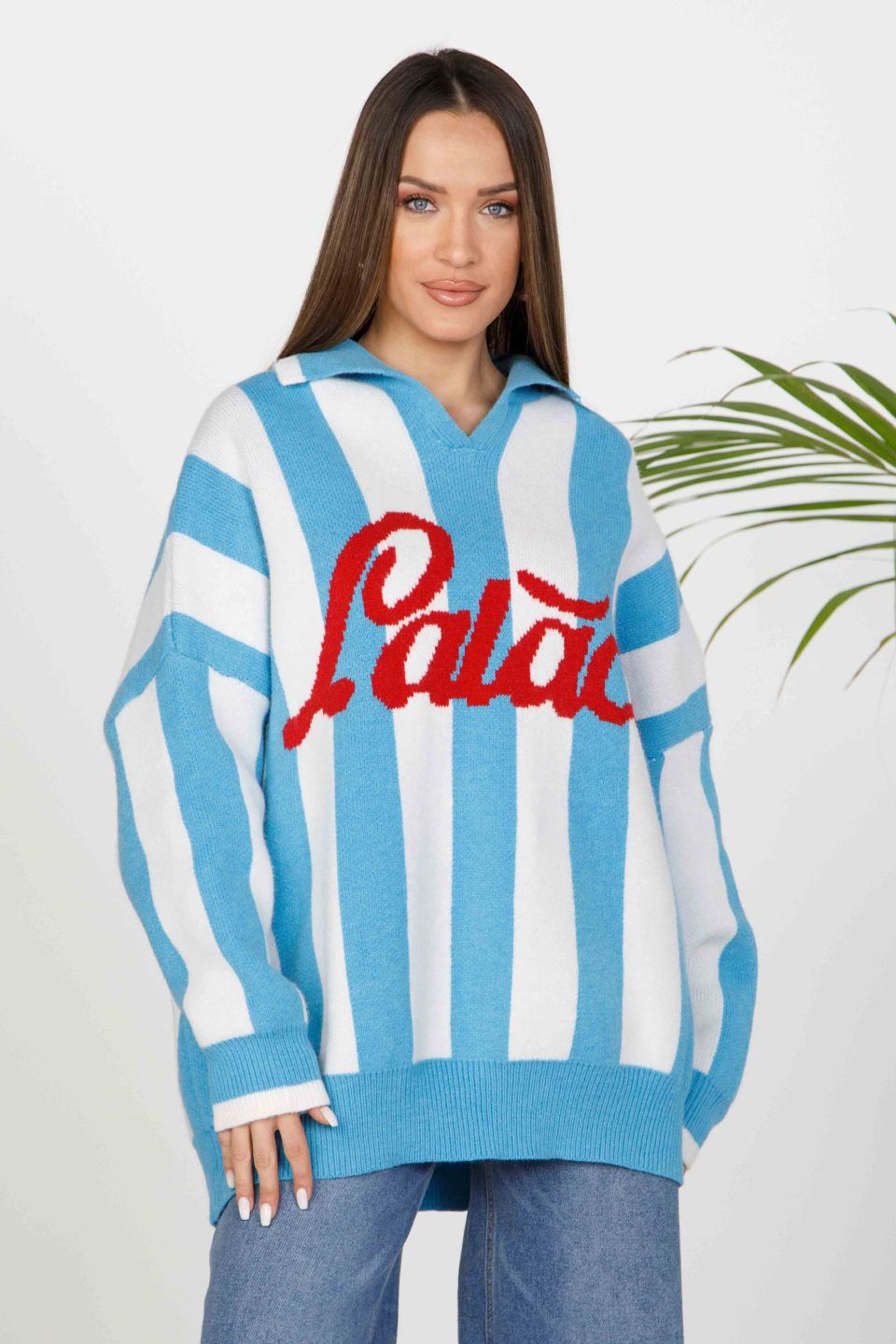 Oversized knit sweater with collar and bold stripes