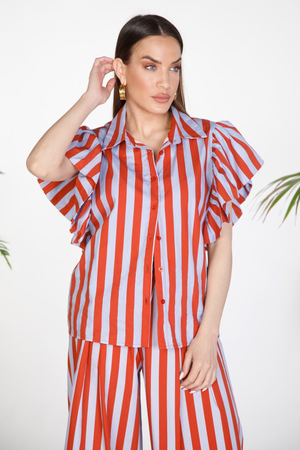 Striped shirt with dramatic ruffle sleeves