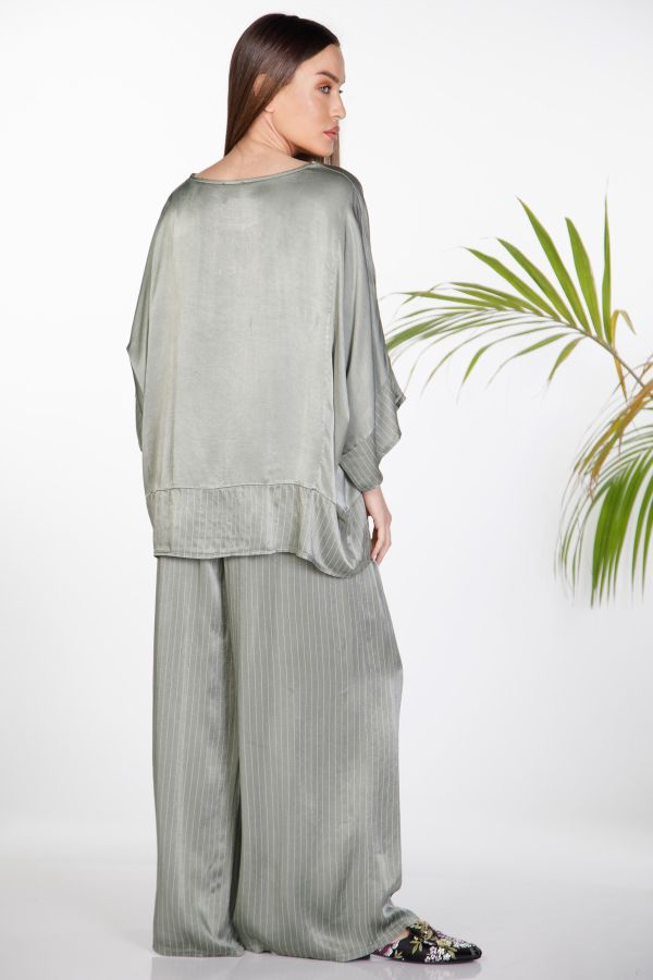 Oversize satin set with batwing sleeves & striped wide-leg trousers