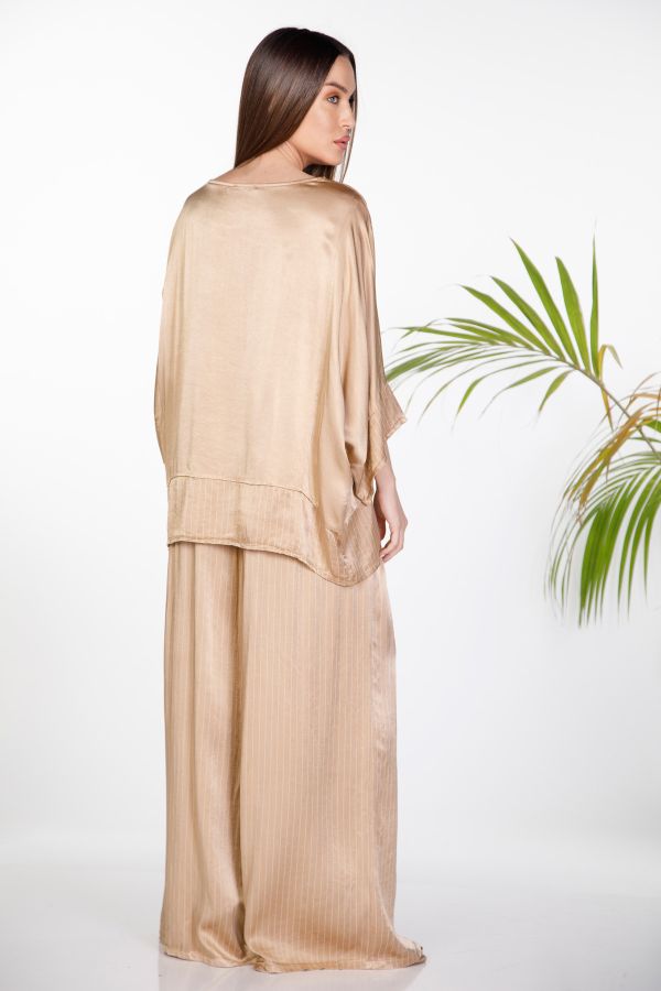 Oversize satin set with batwing sleeves & striped wide-leg trousers