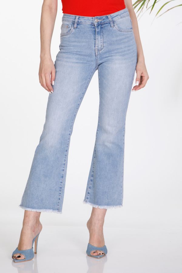 Elastic denim pants with frayed hem